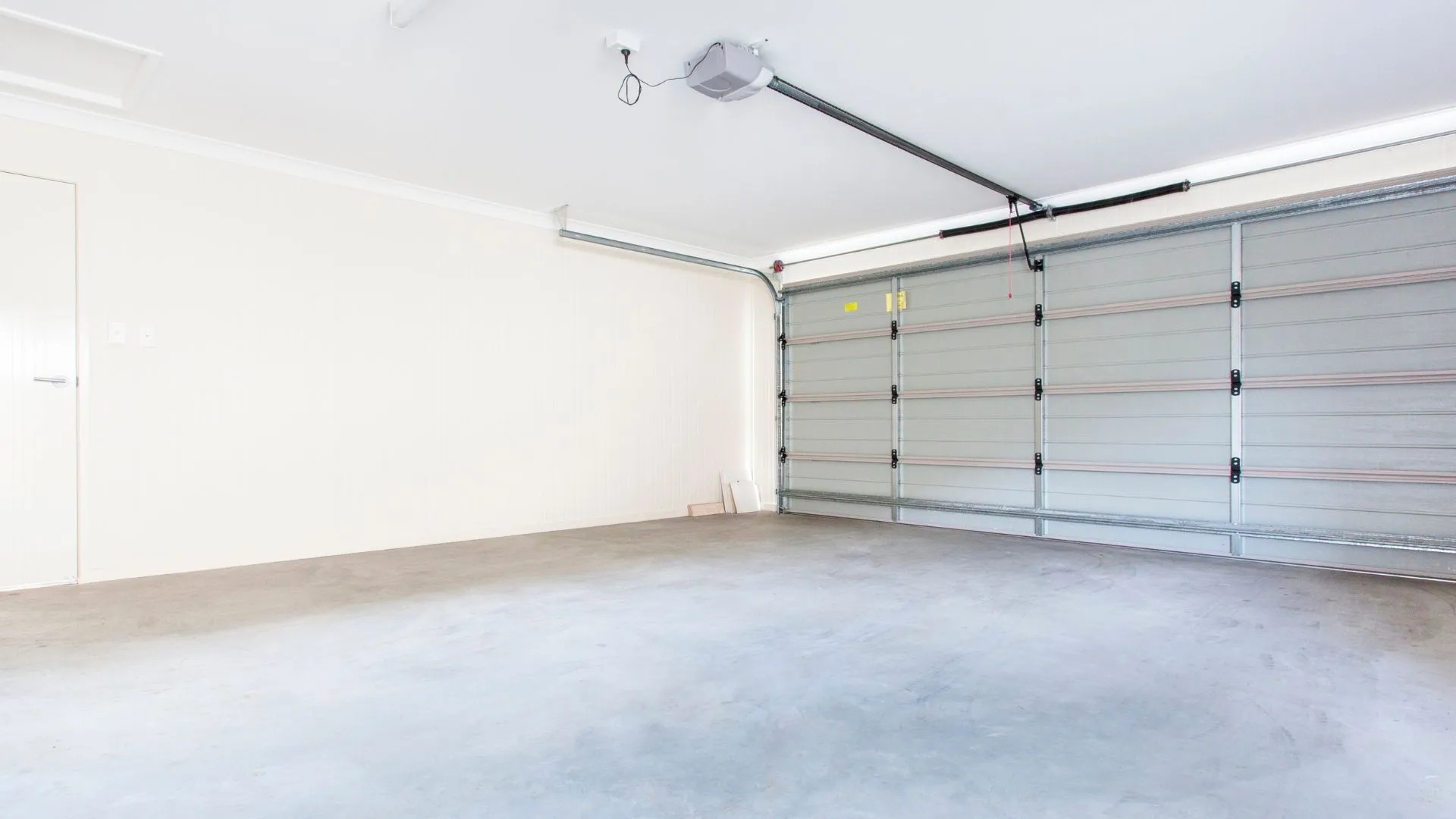 Residential garage with an open garage door